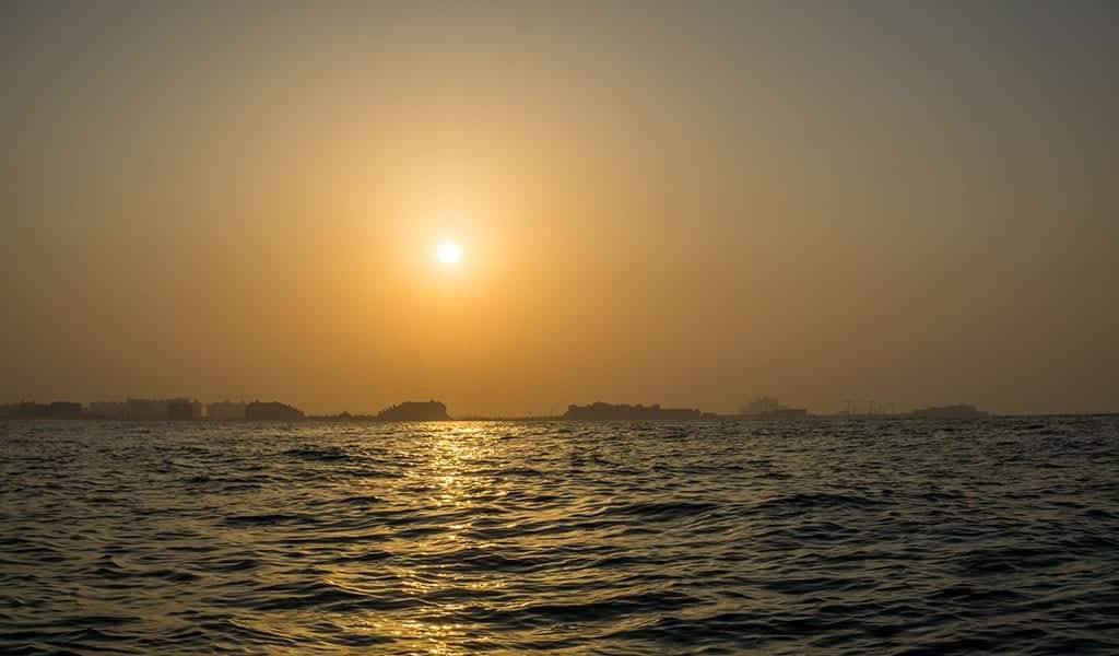 zonsondergang zee dubai